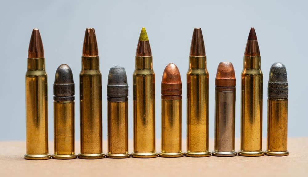 17 HMR ammo side by side with 22 LR ammo