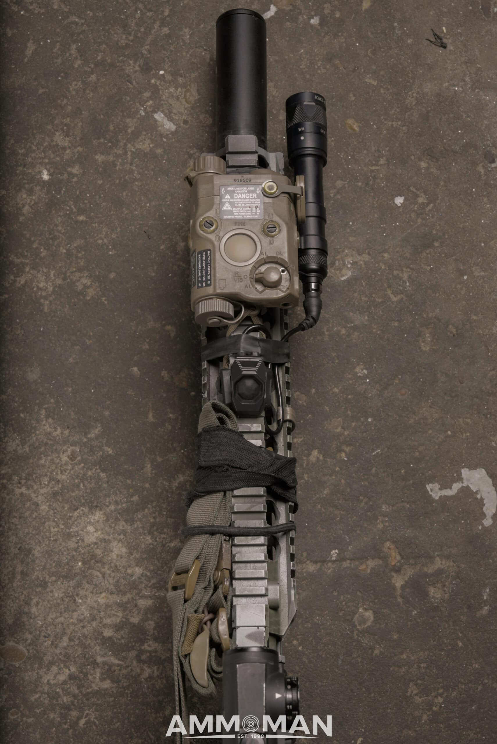 14.5" rifle equipped with light, laser, and suppressor.
