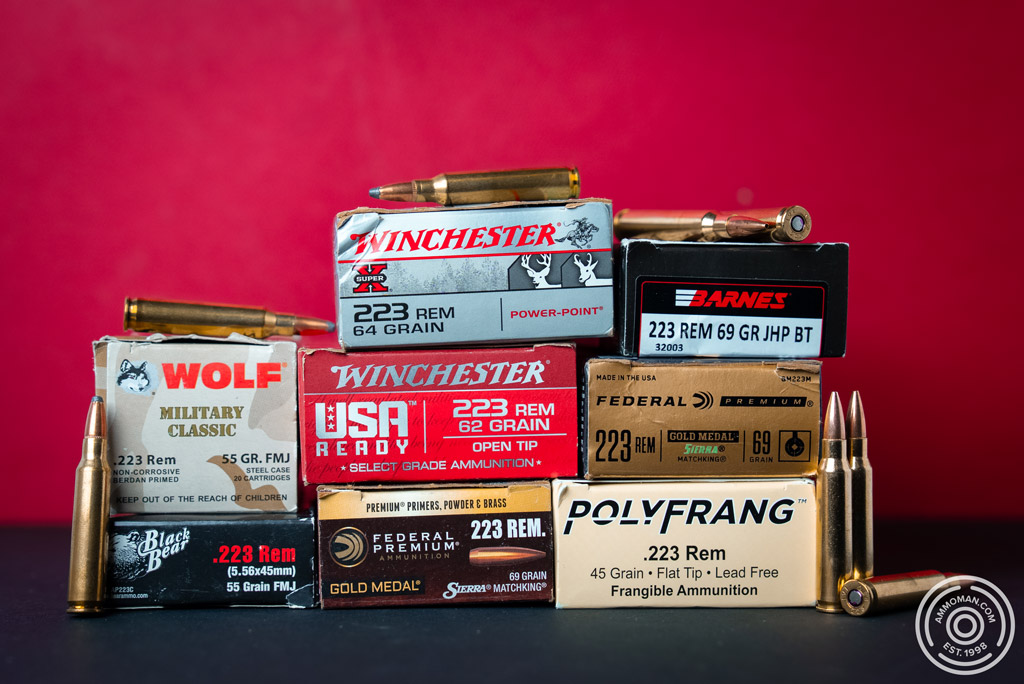 Stacked boxes of various of .223 brands and grain weights.