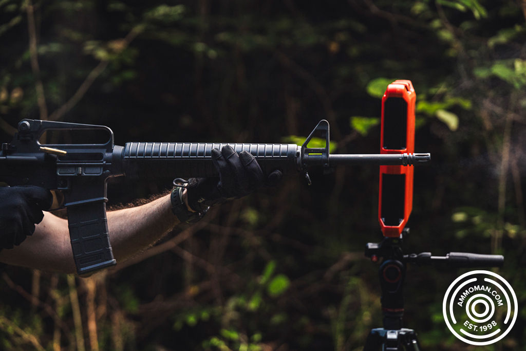 Shooting 223 ammo in an AR-15 Firing an AR-15 with 223 ammo at a shooting range in front of a chronograph