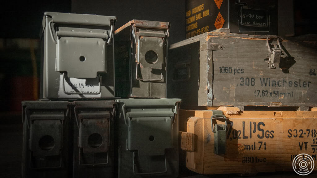 Ammunition crates sitting in sunlight.