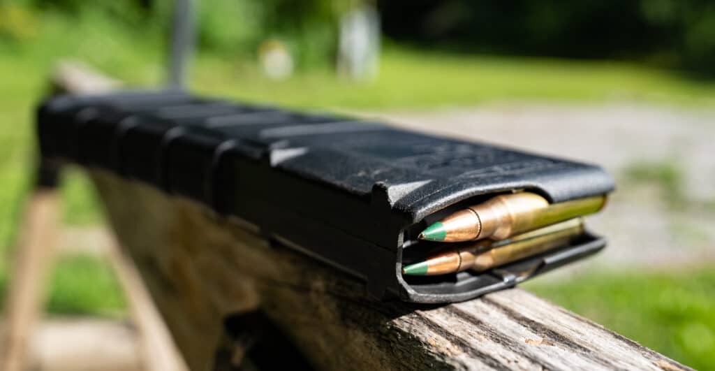 Green tipped M855 5.56 ammo loaded into a magazine