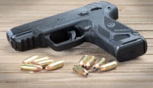 Gun and different types of ammo Guns and ammo