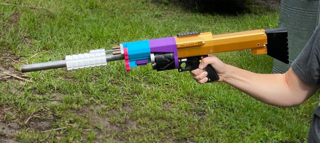 A competitive shooter demonstrates a 3D printed shotgun