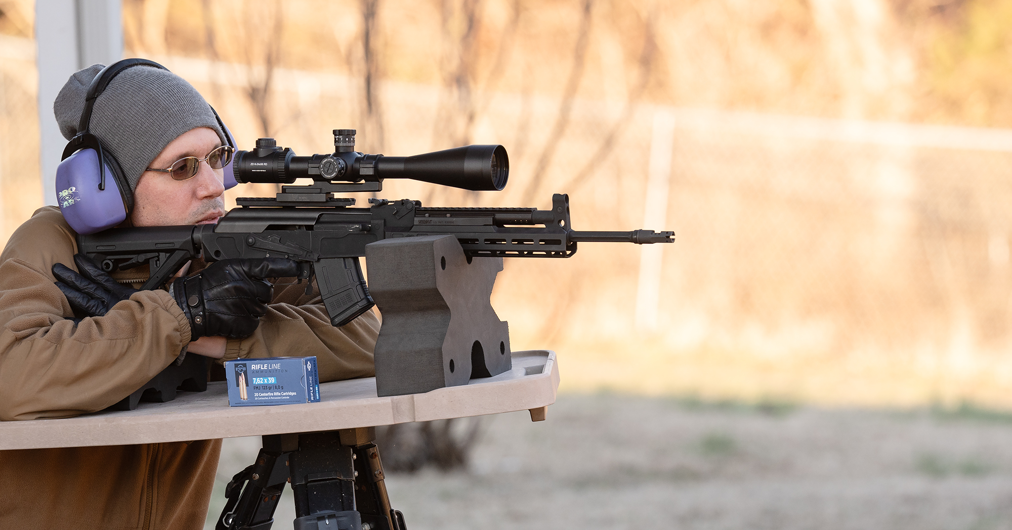 The author firing an AK-47 at the range