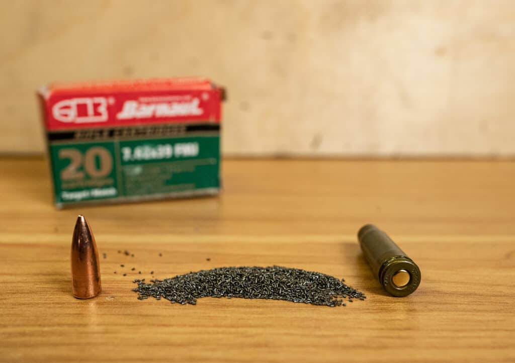 a dissected round of 7.62x39 ammo showing the powder and primer relationship