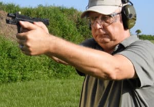 At the range, shooting the Smith & Wesson Shield 380 EZ Review